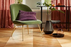 Wood flooring with a lime green chair